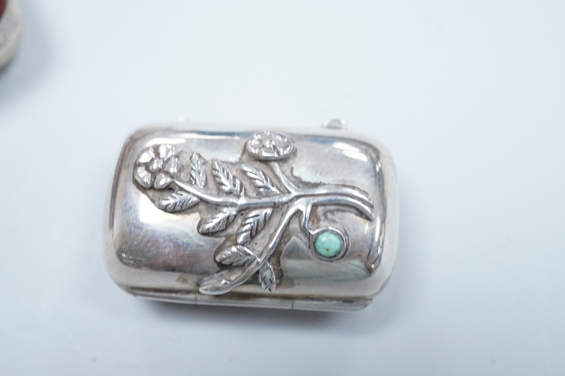 A continental 935 standard white metal oval box, with inset frosted glass and marcasite set hinged cover, 82mm, together with three assorted small pill boxes, including enamelled(a.f.), an Italian 800 standard and a mode
